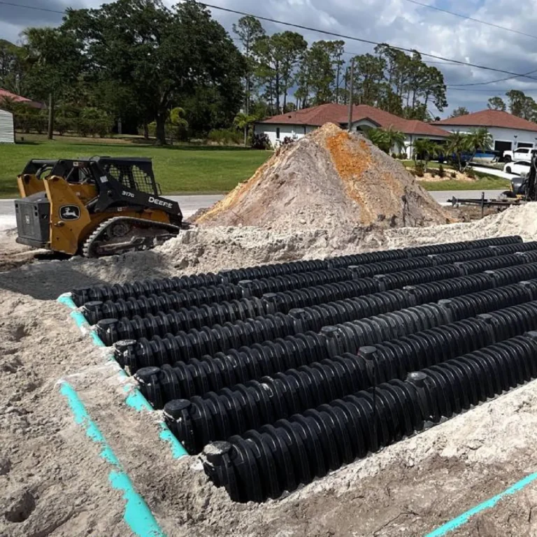 Drain field chambers in position before backfill on a residential septic installation in North Port, Florida.